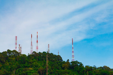 Obraz premium Multiple telecommunication tower on mountain with beauty blue sky