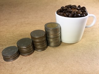 Coin Stack hierarchy of success. About Coffee, Brown background