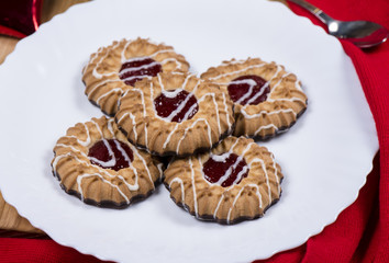 cookies on a tray next to the coffee for the new year