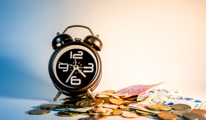 Money and Alarm clock