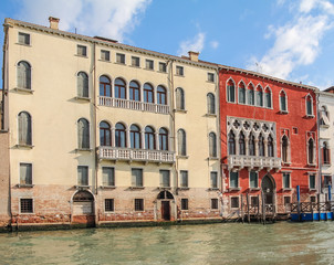 Fototapeta na wymiar Facades of houses in the Italian Venice over the water