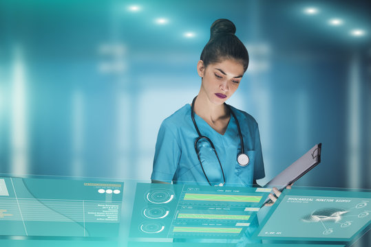 woman doctor or nurse futuristic concept, that is using a holographic medical workstation panel in order to monitor health data of a patient in the hospital, advertising image with copy space