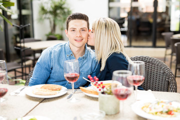 Couple in love eating at a restaurant