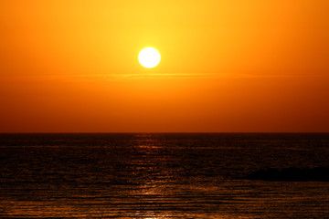 sunset in winter, cloudy sky red