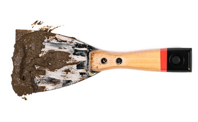 dirty with mud metal spatula isolated on a white