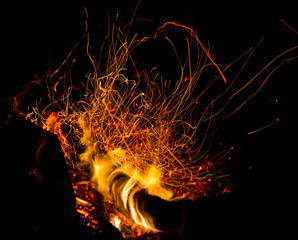 fire with sparks on a black background