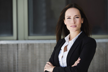 Business woman with crossed arms