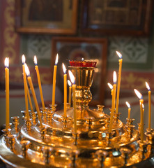 candles burning in orthodox church