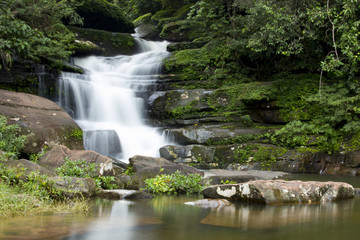 Beautiful waterfall in Thailand and nature background © mckaphoto