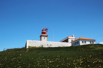 Fototapeta na wymiar A lighthouse at Caba Da Roca, Portugal 