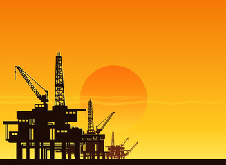 Fototapeta na wymiar silhouette of working oil pumps on sunset background