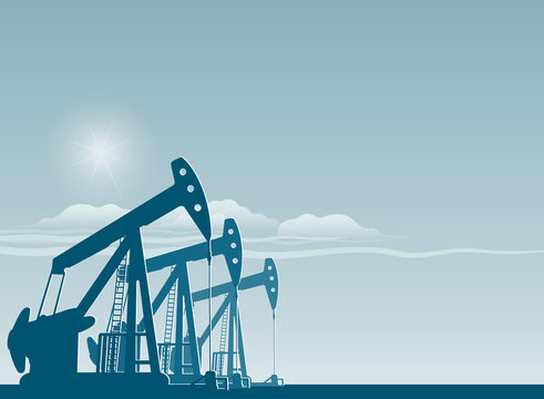 silhouette of working oil pumps , oil industry equipment