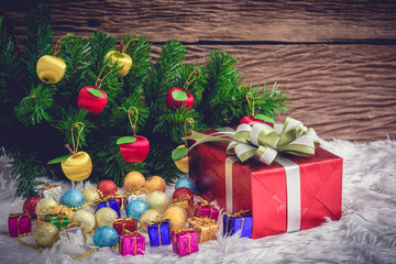 Gift box and Christmas tree ornaments