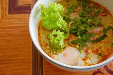 noodle tom yam with  soft boiled egg
