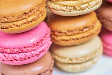 A pile of colorful french macaroons