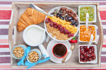 French breakfast on a wooden tray