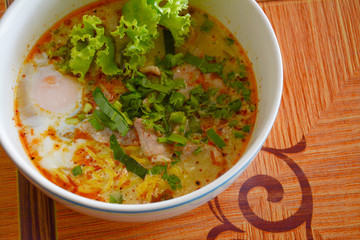 noodle tom yam with  soft boiled egg