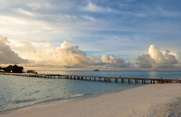 Sunset on the beach with beautiful sky background.