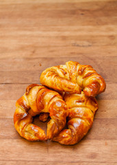 croissant bakery on teak wood table