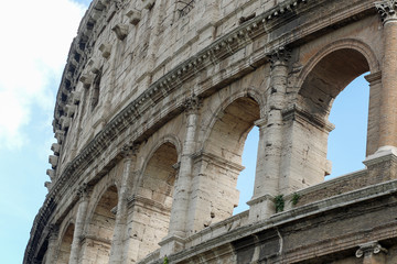 Fototapeta premium Coloseum details on a blue sky, Rome, Italy