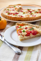 Tart with salted sheep cheese and tomatoes