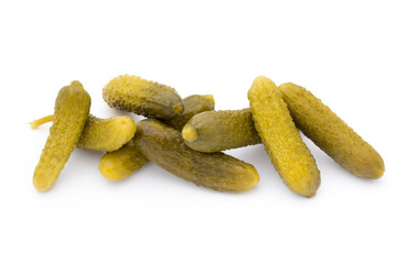 Marinated pickled cucumbers isolated on the white.