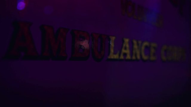 detail footage of ambulance at accident scene by night 