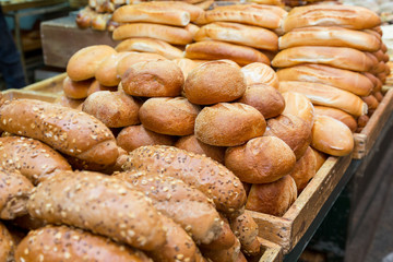 fresh baked buns and loafs on a market