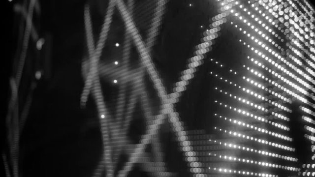 Universe unsaturated moving bokeh unfocused lights in club