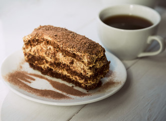 Chocolate cake and cup of coffee