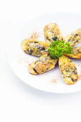 Baked New Zealand Mussels Six Pieces with Cheese on White Round Plate, Isolated on White Background