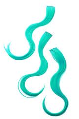 Three turquoise color hair pieces on background