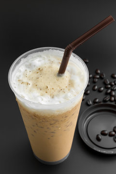 Iced latte coffee with coffee beans