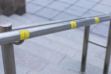 handrail for blind. Yellow mark on the handrail of ladder for blindness people.