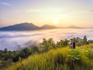 Fototapeta na wymiar Aerial view of sunrise and fog and mountain in thailand