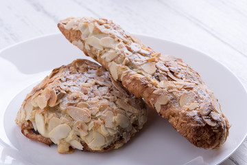 Almond croissants on dish