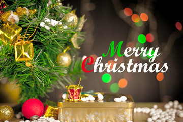 Merry Christmas and Happy New Year text with gift boxes and ornaments in white bokeh background