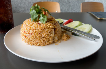 delicious sea food fried rice in wood table