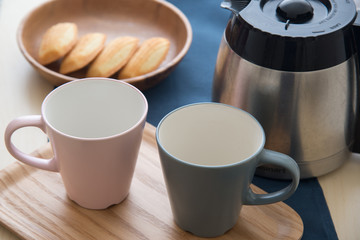 pair of mug and coffee pot