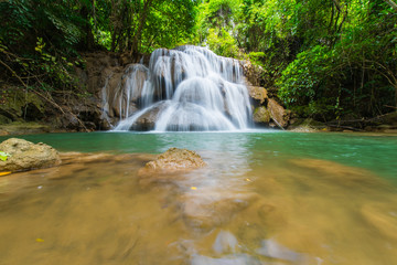 Fototapeta na wymiar Waterfalls in the tropical rain forest in Thailand