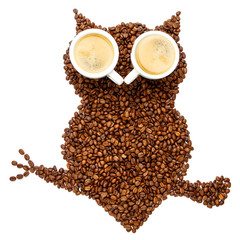 owl made of roasted coffee beans isolated on white background