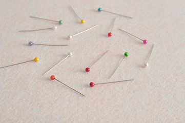 Pins for needle work isolated against a white background