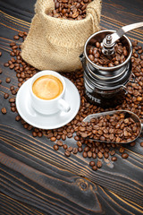 roasted coffee beans on wooden background