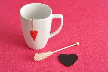 Valentine's Day. A white mug with a red heart 