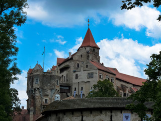 Fototapeta na wymiar Pernstejn Castle is a castle on a rock above the village of Nedvedice some 40 kilometres 25 mi northwest of Brno, in the South Moravian Region, Czech Republic. 