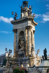 Fountain with statues in center of placa Espanya, Barcelona Spain