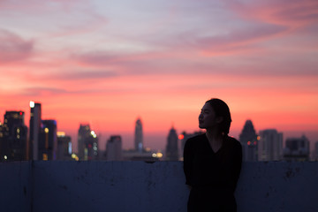 Fototapeta premium People at roof top during evening sky