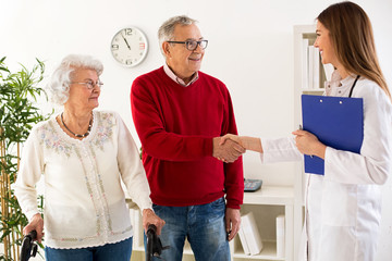 Senior couple visit doctor about medic consultation