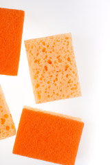 yellow and orange kitchen sponge isolated on white background.