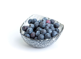 blueberry in glass bowl isolated on white background